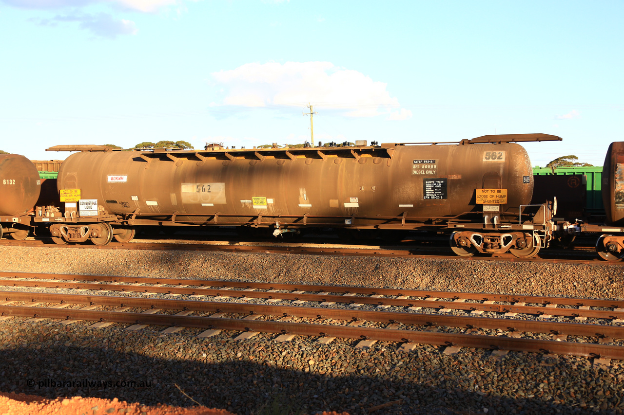 240328 3178
West Kalgoorlie, Viva Energy's ATLF type fuel tank waggon ATLF 562 tank waggon, built by WAGR Midland Workshops in 1973 for Shell as a WJL type with a 86,4900 kL one compartment one dome capacity. Current safe fill level of 80,500 litres, fitted with type F InterLock couplers. Pacific National's 5445 empty fuel train to Esperance. March 28.2024.
Keywords: ATLF-type;ATLF562;WAGR-Midland-WS;WJL-type;