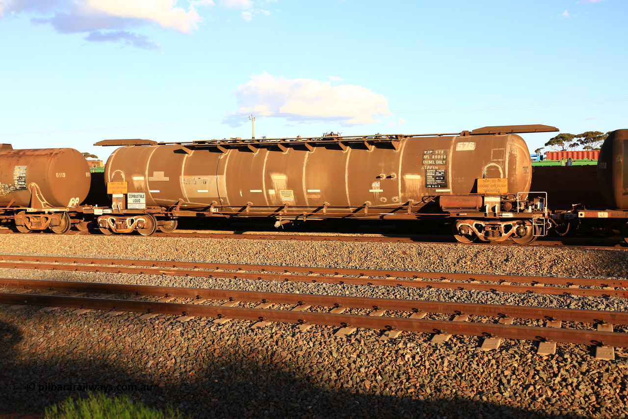 240328 3184
West Kalgoorlie, Viva Energy's APTF type fuel tank waggon ATPF 576 built by WAGR Midland Workshops in 1974 for Shell, in a batch of nine, as a WJP type 80,660 litre, one compartment one dome tank waggon, with a SFL of 80,500 litres, fitted with type F InterLock couplers. Pacific National empty fuel train 5445 to Esperance. March 28, 2024.
Keywords: ATPF-type;ATPF576;WAGR-Midland-WS;WJP-type;