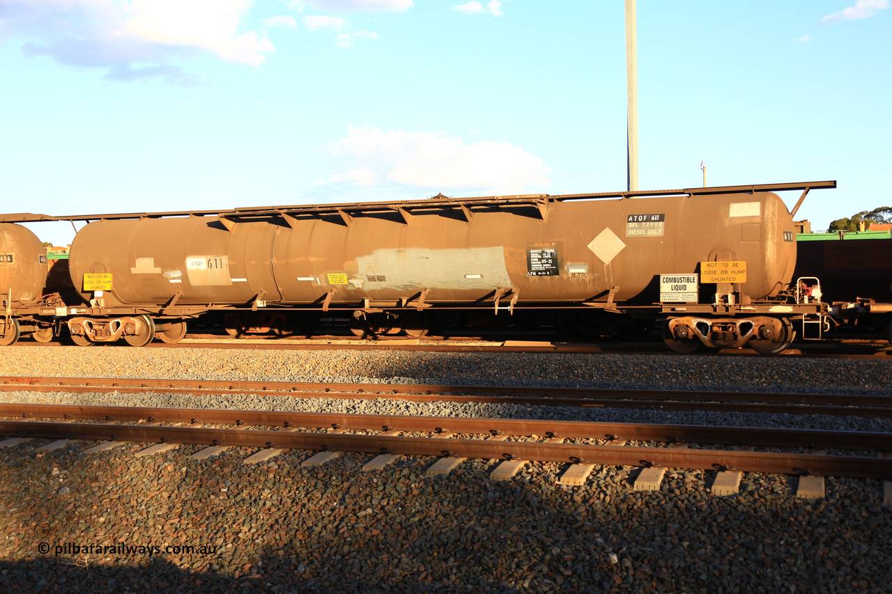 240328 3186
West Kalgoorlie, Viva Energy's ATQF type fuel tank waggon ATQF 611, built by Indeng Qld 1982, in a batch of two, for Shell as type WJQ, 79,340 litre, one compartment one dome, fitted with type F InterLock couplers. Indeng name still visible at far end. Safe fill level of 72,000 litres. Pacific National empty fuel train 5445 to Esperance. March 28, 2024.
Keywords: ATQF-type;ATQF611;Indeng-Qld;WJQ-type;