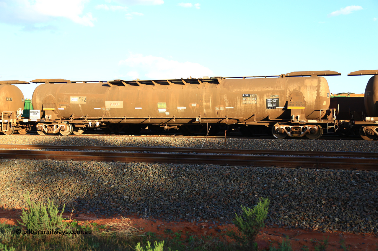 240328 3188
West Kalgoorlie, Viva Energy's ATMF type fuel tank waggon ATMF 552 is one of three built by Tulloch Limited NSW as the WJM type in 1971 with a capacity of 96,250 litres with one compartment and one dome, current Safe Fill Level [SFL] capacity of 80,500 litres, fitted with type E coupler. WJM's 551 and 552 built for Shell and 553 built for BP Oil. Pacific National's 5445 empty fuel train to Esperance. March 28.2024.
Keywords: ATMF-type;ATMF552;Tulloch-Ltd-NSW;WJM-type;