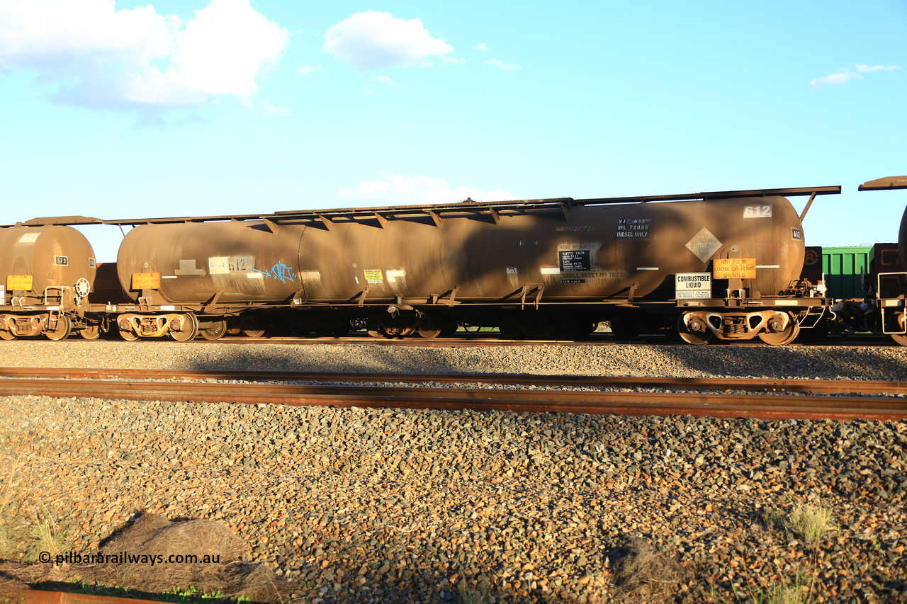 240328 3192
West Kalgoorlie, Viva Energy's ATQF type fuel tank waggon ATQF 612, built by Indeng Qld 1982, in a batch of two, for Shell as type WJQ, 79,340 litre, one compartment one dome, fitted with type F InterLock couplers. Shell Fleet No. TR721 still visible and Indeng builders plate visible at the far end. Safe fill level of 72,000 litres. Pacific National empty fuel train 5445 to Esperance. March 28, 2024.
Keywords: ATQF-type;ATQF612;Indeng-Qld;WJQ-type;