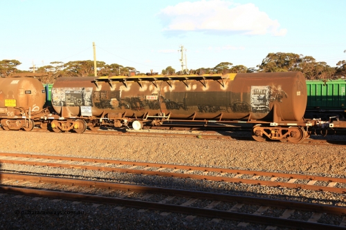 240328 3173
West Kalgoorlie, Viva Energy's NTBF 6121 fuel tank waggon, built by Comeng NSW in 1975 as SCA type SCA 272 for Shell Bitumen, fitted with conventional couplers with a diesel capacity of 62,700 litres, on Pacific National's train 5445 empty fuel to Esperance. March 28, 2024.
Keywords: NTBF-type;NTBF6121;Comeng-NSW;SCA-type;SCA272;NTAF-type;
