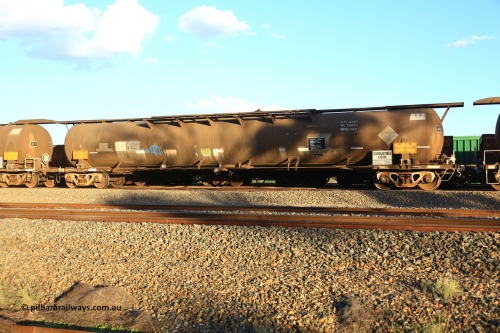 240328 3192
West Kalgoorlie, Viva Energy's ATQF type fuel tank waggon ATQF 612, built by Indeng Qld 1982, in a batch of two, for Shell as type WJQ, 79,340 litre, one compartment one dome, fitted with type F InterLock couplers. Shell Fleet No. TR721 still visible and Indeng builders plate visible at the far end. Safe fill level of 72,000 litres. Pacific National empty fuel train 5445 to Esperance. March 28, 2024.
Keywords: ATQF-type;ATQF612;Indeng-Qld;WJQ-type;