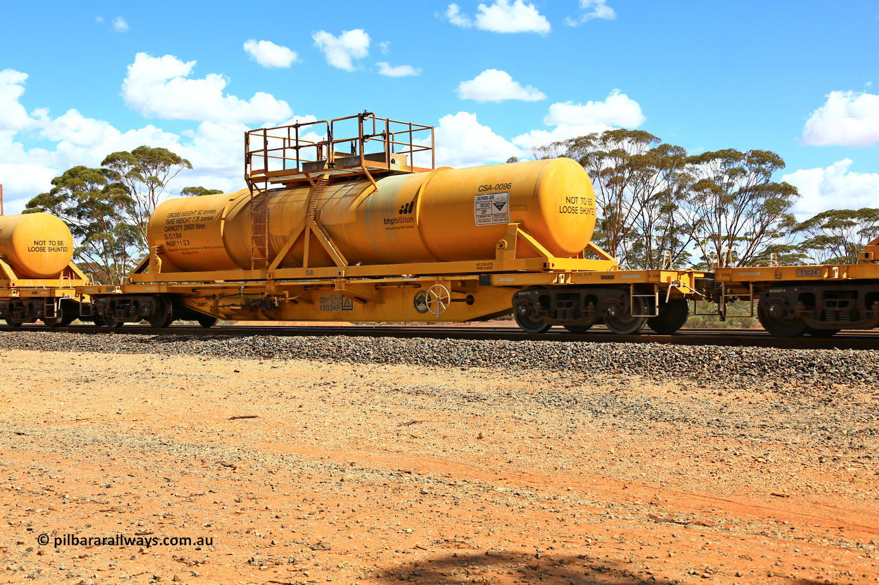 240328 3104
Hampton Ballast Siding, Watco's 5WS4 loaded acid transfer train with 57' DQHY type flat waggon built by CRRC, China in 2022 as a batch of sixty for Watco to carry the CSA acid tanks, DQHY 13034 with CSA-0096 acid tank. March 28, 2024.
Keywords: DQHY-type;DQHY13034;CRRC-China;