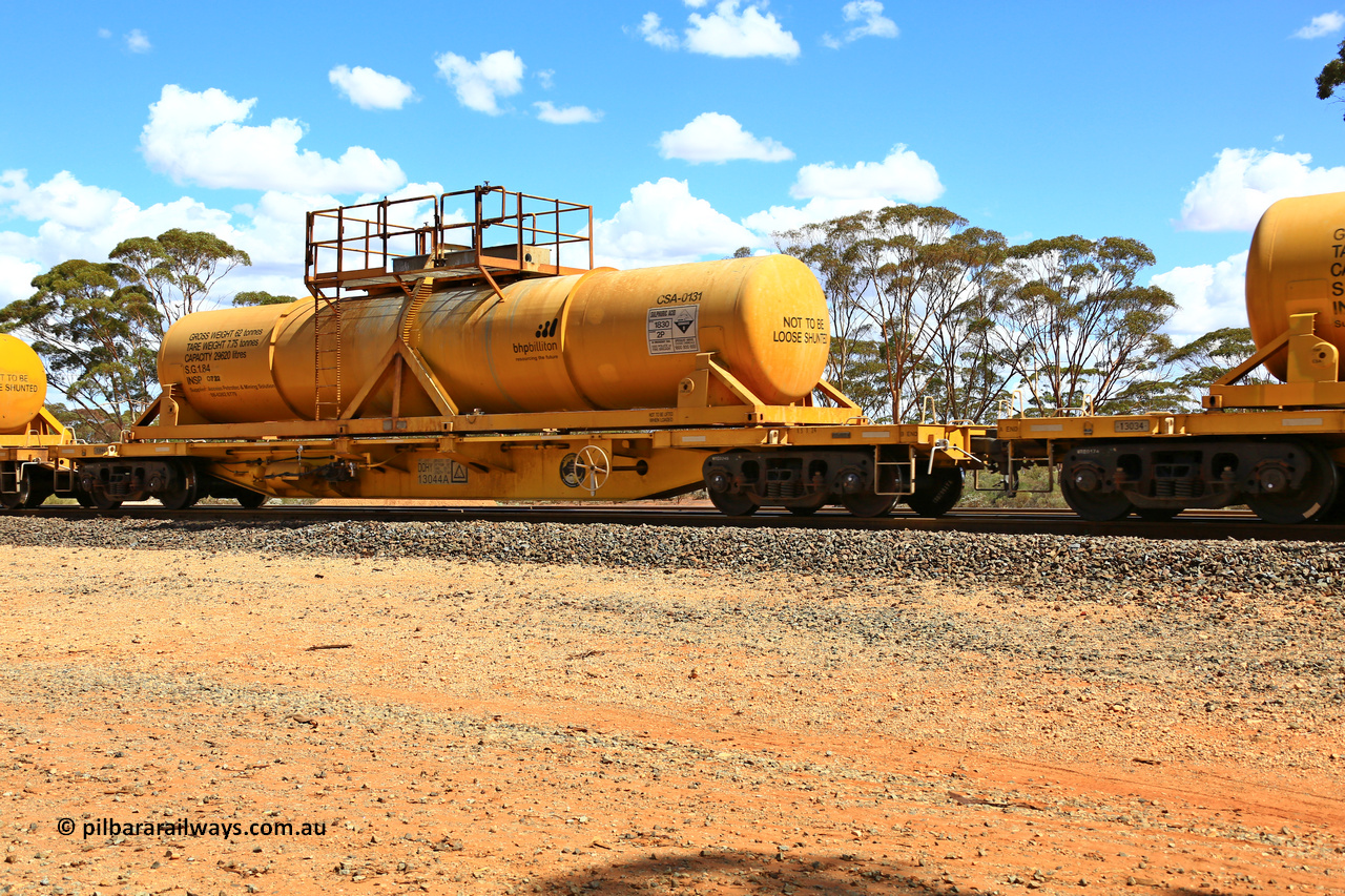 240328 3105
Hampton Ballast Siding, Watco's 5WS4 loaded acid transfer train with 57' DQHY type flat waggon built by CRRC in China for Watco to carry the CSA acid tanks, DQHY 13044 with CSA-0131 acid tank. March 28, 2024.
Keywords: DQHY-type;DQHY13044;CRRC-China;