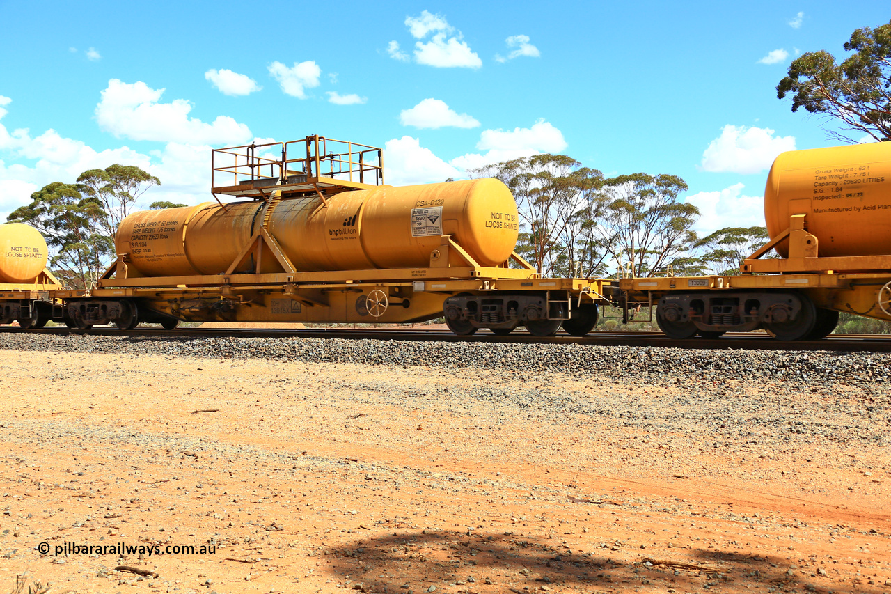 240328 3109
Hampton Ballast Siding, Watco's 5WS4 loaded acid transfer train with 57' DQHY type flat waggon built by CRRC in China for Watco to carry the CSA acid tanks, DQHY 13015 with CSA-0129 acid tank. March 28, 2024.
Keywords: DQHY-type;DQHY13015;CRRC-China;