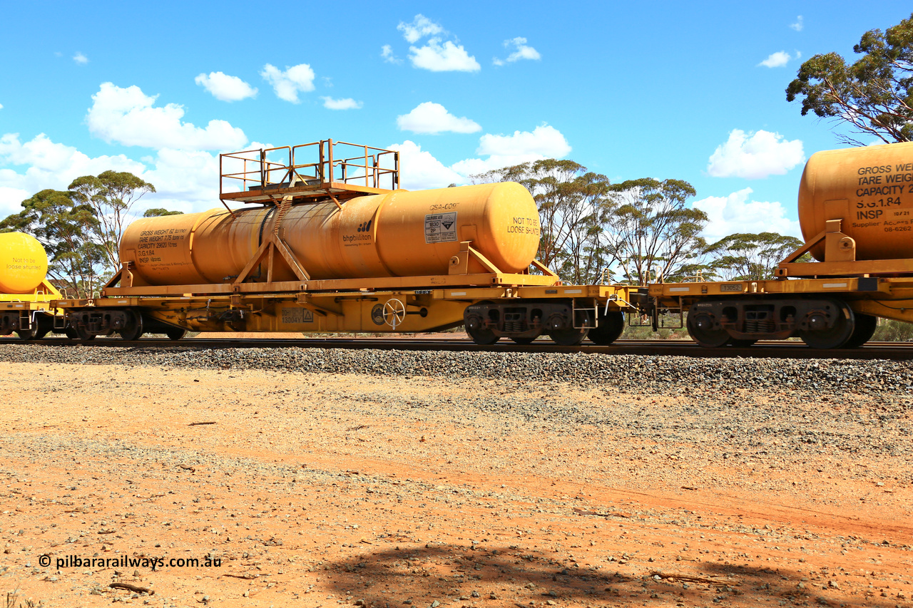 240328 3116
Hampton Ballast Siding, Watco's 5WS4 loaded acid transfer train with 57' DQHY type flat waggon built by CRRC, China in 2022 as a batch of sixty for Watco to carry the CSA acid tanks, DQHY 13004 with CSA-0097 acid tank. March 28, 2024.
Keywords: DQHY-type;DQHY13004;CRRC-China;