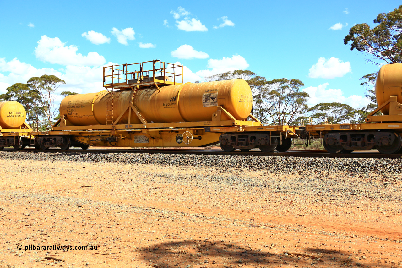 240328 3121
Hampton Ballast Siding, Watco's 5WS4 loaded acid transfer train with 57' DQHY type flat waggon built by CRRC, China in 2022 as a batch of sixty for Watco to carry the CSA acid tanks, DQHY 13020 with CSA-0123 acid tank. March 28, 2024.
Keywords: DQHY-type;DQHY13020;CRRC-China;