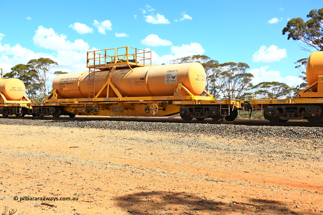 240328 3128
Hampton Ballast Siding, Watco's 5WS4 loaded acid transfer train with 57' DQHY type flat waggon built by CRRC, China in 2022 as a batch of sixty for Watco to carry the CSA acid tanks, DQHY 13040 with CSA-0114 acid tank. March 28, 2024.
Keywords: DQHY-type;DQHY13040;CRRC-China;