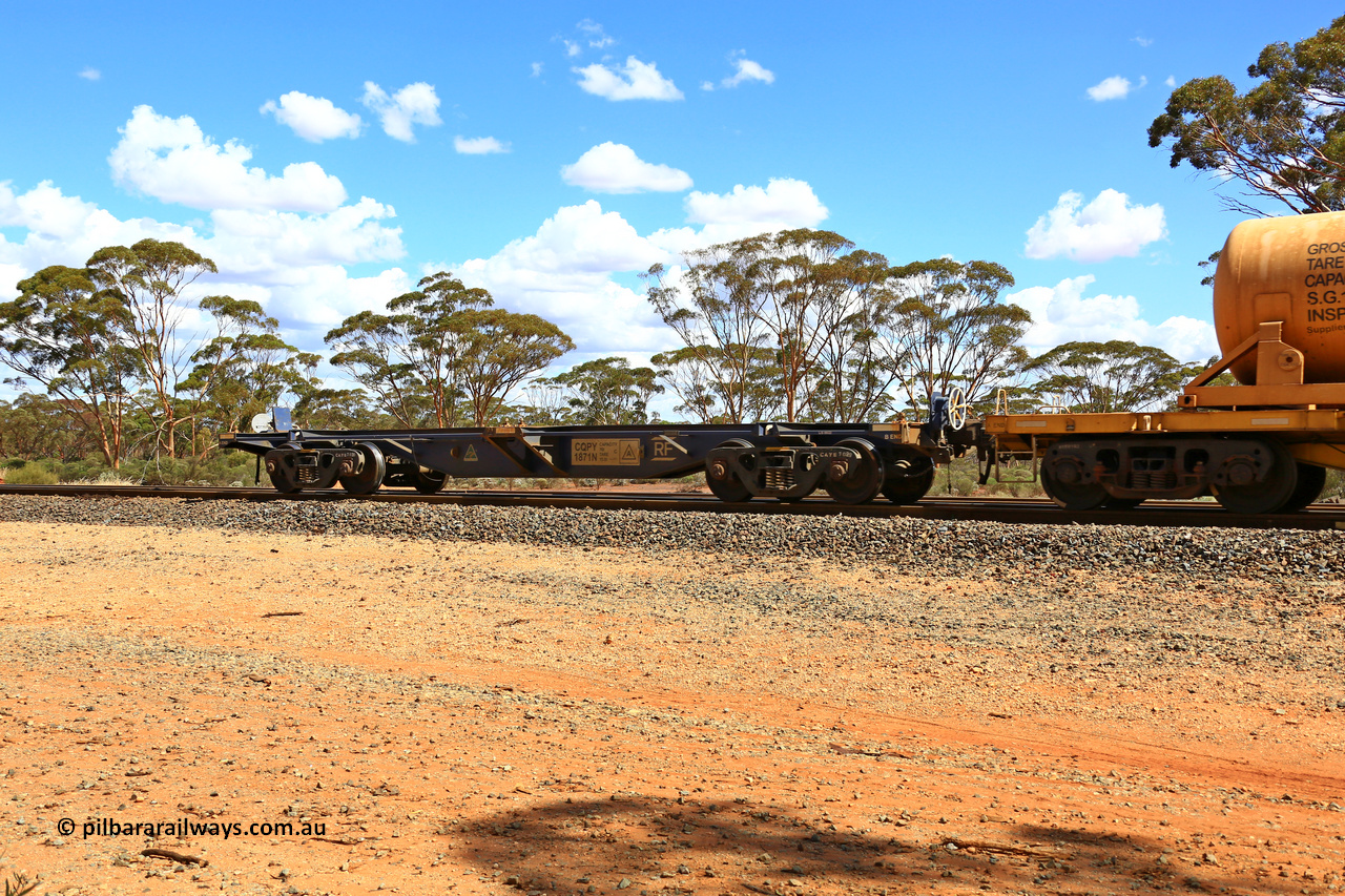 240328 3130
Hampton Ballast Siding, Watco operated loaded acid transfer train 5WS4 from the smelter at Hampton to the sidings here. CQPY type 40' container waggon CQPY 1871 is one of two hundred built by Rail First  at their Islington workshops, SA in 2021-2023. In use here as a safety waggon. March 28, 2024.
Keywords: CQPY-type;CQPY1871;Rail-First-Islington-WS-SA;