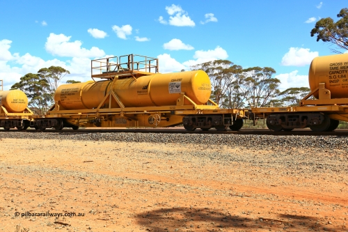 240328 3106
Hampton Ballast Siding, Watco's 5WS4 loaded acid transfer train with 57' DQHY type flat waggon built by CRRC, China in 2022 as a batch of sixty for Watco to carry the CSA acid tanks, DQHY 13036 with CSA-0107 acid tank. March 28, 2024.
Keywords: DQHY-type;DQHY13036;CRRC-China;