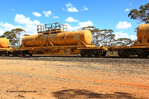 240328 3114
Hampton Ballast Siding, Watco's 5WS4 loaded acid transfer train with 57' DQHY type flat waggon built by CRRC, China in 2022 as a batch of sixty for Watco to carry the CSA acid tanks, DQHY 13058 with CSA-0093 acid tank. March 28, 2024.
Keywords: DQHY-type;DQHY13058;CRRC-China;