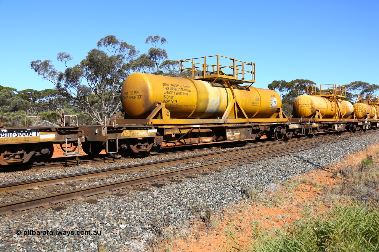 161112 3452
Binduli, loaded Hampton acid train 7406 with AQHY 30095 with sulphuric acid tank CSA 0125, originally built by the WAGR Midland Workshops in 1964/66 as a WF type flat waggon, then in 1997, following several recodes and modifications, was one of seventy five waggons converted to the WQH type to carry CSA sulphuric acid tanks between Hampton/Kalgoorlie and Perth/Kwinana. CSA 0125 was built by Vcare Engineering, India for Access Petrotec & Mining Solutions.
Keywords: AQHY-type;AQHY30095;WAGR-Midland-WS;WF-type;WFP-type;WFDY-type;WFDF-type;RFDF-type;WQH-type;