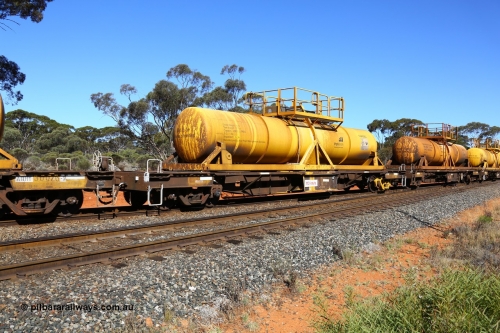 161112 3454
Binduli, loaded Hampton acid train 7406 with AQHY 30056 with sulphuric acid tank CSA 0083, originally built by the WAGR Midland Workshops in 1964/66 as a WF type flat waggon, then in 1997, following several recodes and modifications, was one of seventy five waggons converted to the WQH type to carry CSA sulphuric acid tanks between Hampton/Kalgoorlie and Perth/Kwinana. CSA 0083 was built by Acid Plant Management Services, WA.
Keywords: AQHY-type;AQHY30056;WAGR-Midland-WS;WF-type;WFDY-type;WFDF-type;RFDF-type;WQH-type;