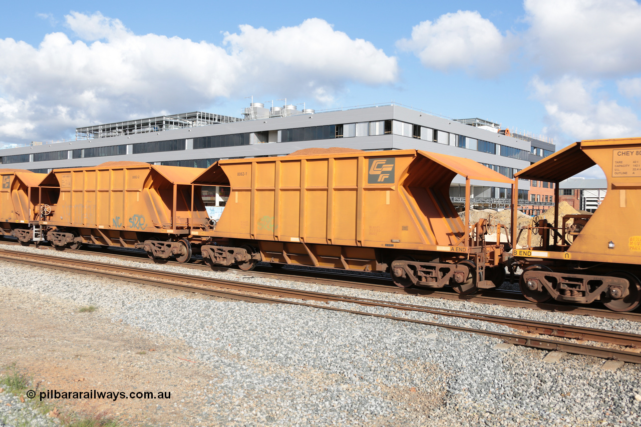 140601 4626
Midland, loaded iron ore train #1030 heading to Kwinana, CFCLA leased CHEY type waggon CHEY 8062 one pair of 120 bar coupled pairs built by Bluebird Rail Operations SA in 2011-12. 1st June 2014.
Keywords: CHEY-type;CHEY8062;Bluebird-Rail-Operations-SA;2011/120-62;