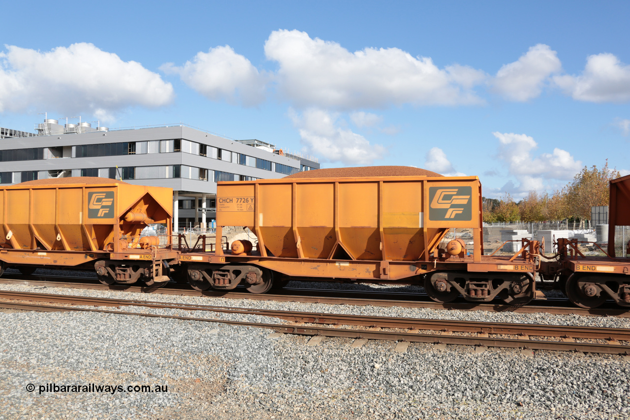 140601 4653
Midland, loaded iron ore train #1030 heading to Kwinana, CFCLA leased CHCH type waggon CHCH 7726 these waggons were rebuilt between 2010 and 2012 by Bluebird Rail Operations SA from former Goldsworthy Mining hopper waggons originally built by Tomlinson WA and Scotts of Ipswich Qld back in the 60's to early 80's. 1st June 2014.
Keywords: CHCH-type;CHCH7726;Bluebird-Rail-Operations-SA;2010/201-126;