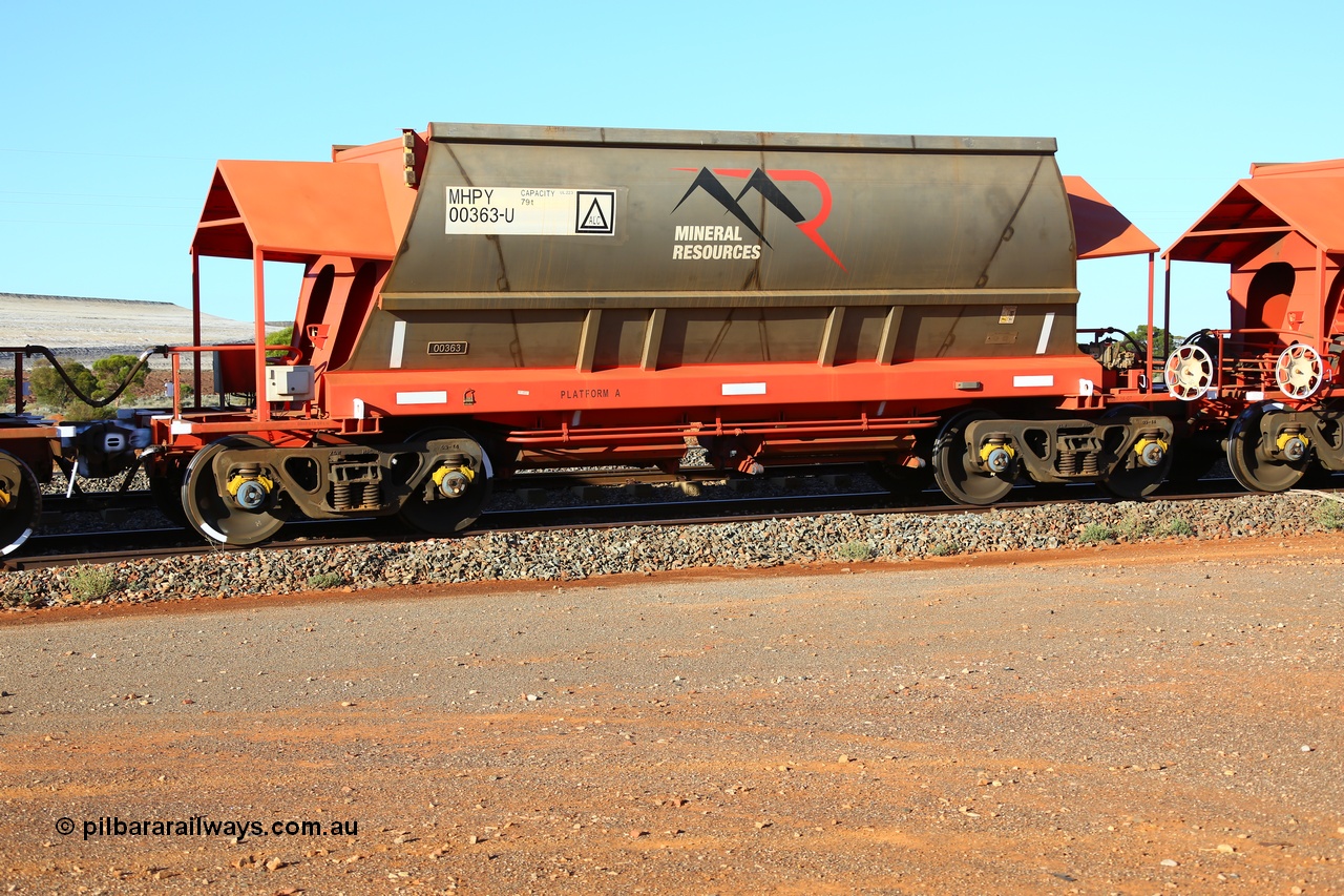 190107 0439
Parkeston, Mineral Resources Ltd MHPY type iron ore waggon MHPY 00363 built by CSR Yangtze Co China in 2014 as a batch of 382 units, these bottom discharge hopper waggons are operated in 'married' pairs.
Keywords: MHPY-type;MHPY00363;2014/382-363;CSR-Yangtze-Rolling-Stock-Co-China;