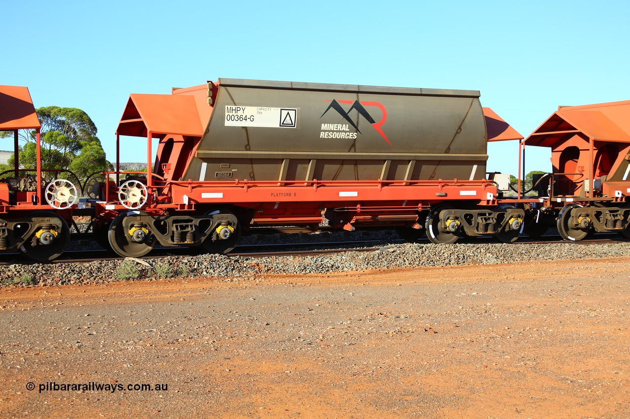 190107 0440
Parkeston, Mineral Resources Ltd MHPY type iron ore waggon MHPY 00364 built by CSR Yangtze Co China in 2014 as a batch of 382 units, these bottom discharge hopper waggons are operated in 'married' pairs.
Keywords: MHPY-type;MHPY00364;2014/382-364;CSR-Yangtze-Rolling-Stock-Co-China;