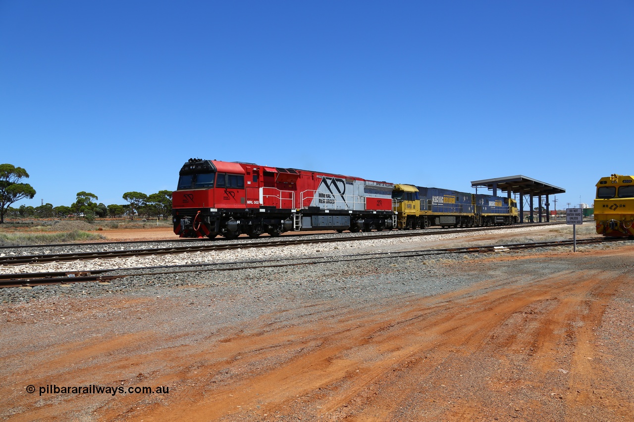 190107 0478
Parkeston, Mineral Resources MRL class loco MRL 002 'Spirit of Yilgarn' with serial R-0113-03/14-505 a UGL Rail Broadmeadow NSW built GE model C44ACi in 2014 is pushed back along the loop to as the power consist of Pacific National NR 60 and NR 8 runs around the waggon rake while Aurizon Q 4006 looks on.
Keywords: MRL-class;MRL002;UGL-Rail-Broadmeadow-NSW;GE;C44ACi;R-0113-03/14-505;