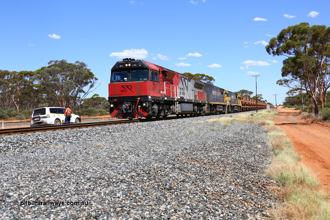 190107 0521
Binduli, following a crew change Mineral Resources empty iron ore train 2034 with Mineral Resources MRL class loco MRL 003 'Southern Cross' with serial R-0113-03/14-506 a UGL Rail Broadmeadow NSW built GE model C44ACi model leads two Pacific National NR class units NR 43 and NR 78 with 53 pairs of MHPYs and 2 single MHLY bottom discharge hopper waggons for 1293 metres and 2258 tonnes.
Keywords: MRL-class;MRL003;R-0113-03/14-506;UGL-Rail-Broadmeadow-NSW;GE;C44aci;