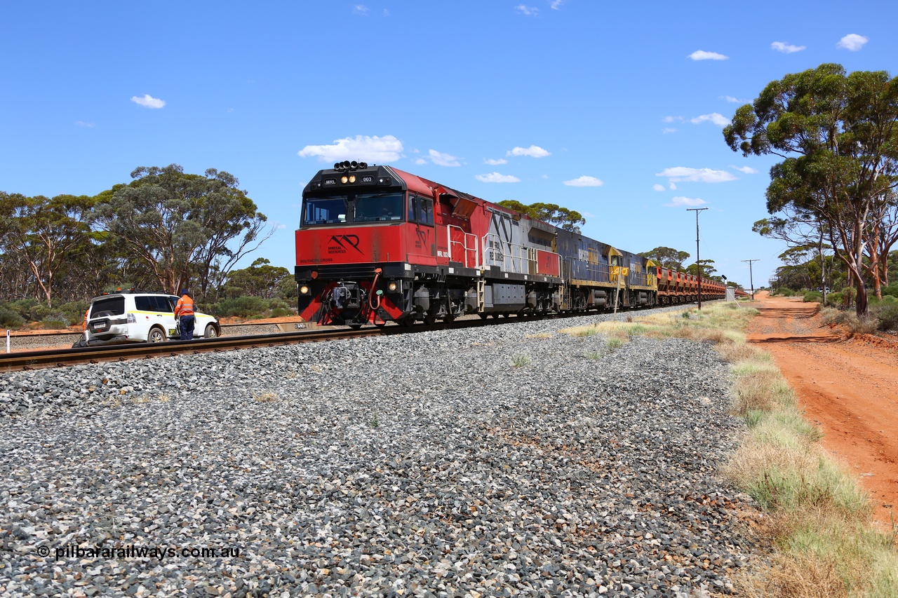 190107 0522
Binduli, following a crew change Mineral Resources empty iron ore train 2034 with Mineral Resources MRL class loco MRL 003 'Southern Cross' with serial R-0113-03/14-506 a UGL Rail Broadmeadow NSW built GE model C44ACi model leads two Pacific National NR class units NR 43 and NR 78 with 53 pairs of MHPYs and 2 single MHLY bottom discharge hopper waggons for 1293 metres and 2258 tonnes.
Keywords: MRL-class;MRL003;R-0113-03/14-506;UGL-Rail-Broadmeadow-NSW;GE;C44aci;