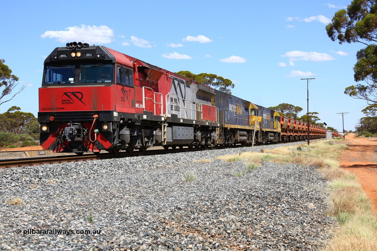 190107 0523
Binduli, following a crew change Mineral Resources empty iron ore train 2034 with Mineral Resources MRL class loco MRL 003 'Southern Cross' with serial R-0113-03/14-506 a UGL Rail Broadmeadow NSW built GE model C44ACi model leads two Pacific National NR class units NR 43 and NR 78 with 53 pairs of MHPYs and 2 single MHLY bottom discharge hopper waggons for 1293 metres and 2258 tonnes.
Keywords: MRL-class;MRL003;R-0113-03/14-506;UGL-Rail-Broadmeadow-NSW;GE;C44aci;