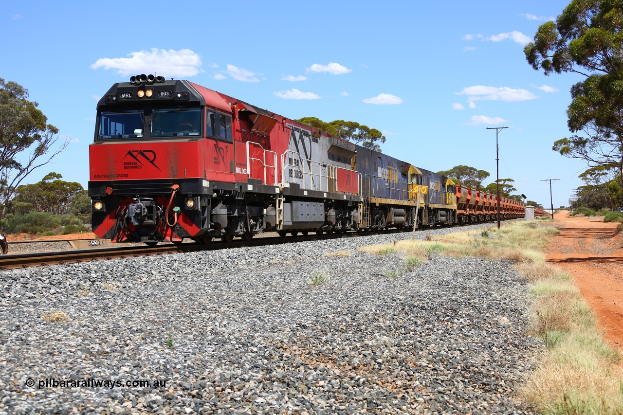 190107 0524
Binduli, following a crew change Mineral Resources empty iron ore train 2034 with Mineral Resources MRL class loco MRL 003 'Southern Cross' with serial R-0113-03/14-506 a UGL Rail Broadmeadow NSW built GE model C44ACi model leads two Pacific National NR class units NR 43 and NR 78 with 53 pairs of MHPYs and 2 single MHLY bottom discharge hopper waggons for 1293 metres and 2258 tonnes.
Keywords: MRL-class;MRL003;R-0113-03/14-506;UGL-Rail-Broadmeadow-NSW;GE;C44aci;