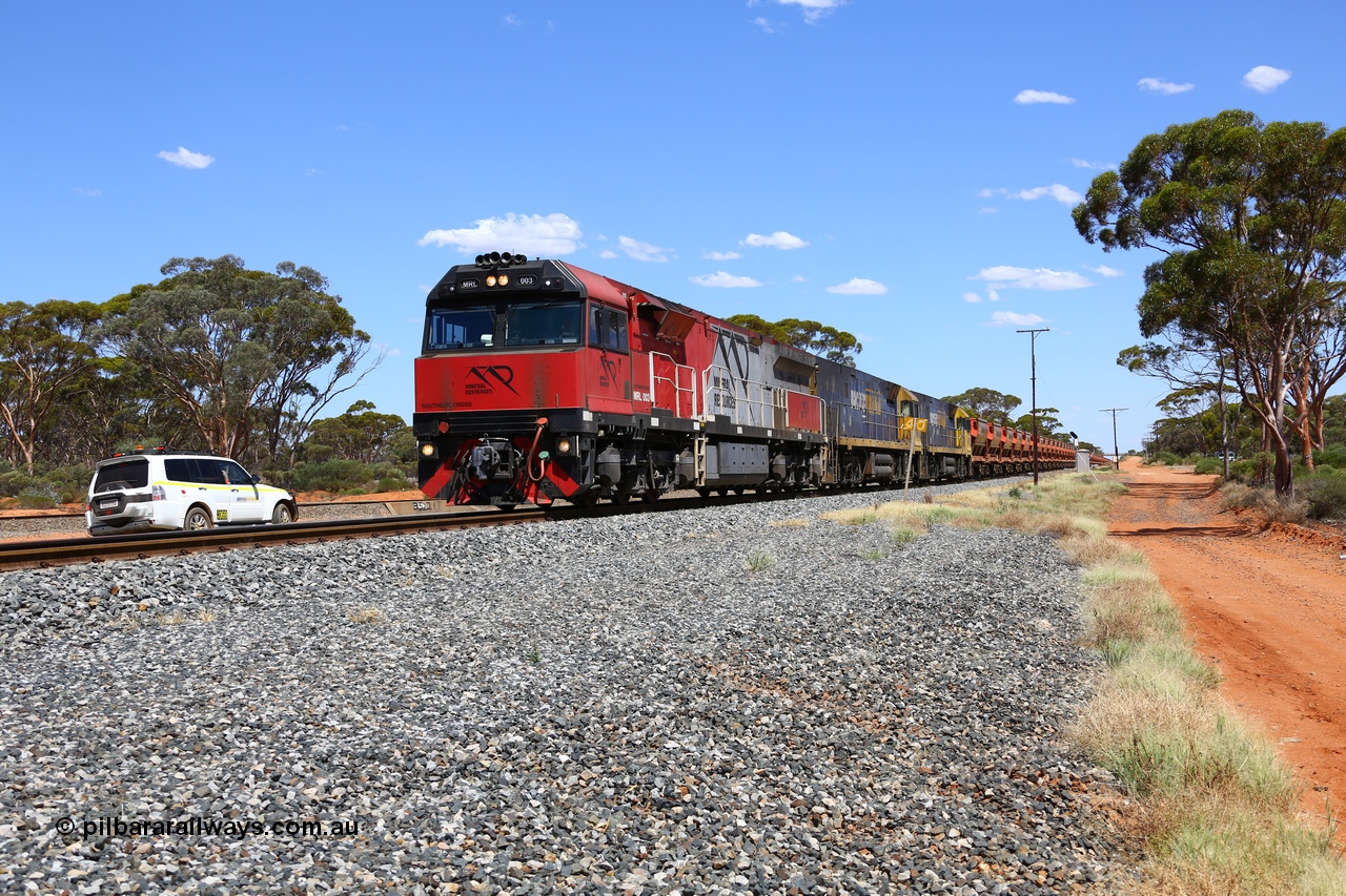 190107 0525
Binduli, following a crew change Mineral Resources empty iron ore train 2034 with Mineral Resources MRL class loco MRL 003 'Southern Cross' with serial R-0113-03/14-506 a UGL Rail Broadmeadow NSW built GE model C44ACi model leads two Pacific National NR class units NR 43 and NR 78 with 53 pairs of MHPYs and 2 single MHLY bottom discharge hopper waggons for 1293 metres and 2258 tonnes.
Keywords: MRL-class;MRL003;UGL-Rail-Broadmeadow-NSW;GE;C44ACi;R-0113-03/14-506;