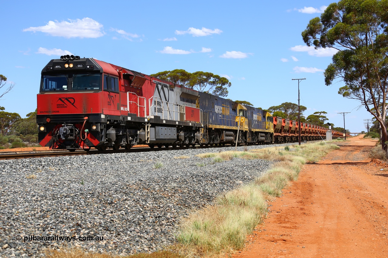190107 0526
Binduli, following a crew change Mineral Resources empty iron ore train 2034 with Mineral Resources MRL class loco MRL 003 'Southern Cross' with serial R-0113-03/14-506 a UGL Rail Broadmeadow NSW built GE model C44ACi model leads two Pacific National NR class units NR 43 and NR 78 with 53 pairs of MHPYs and 2 single MHLY bottom discharge hopper waggons for 1293 metres and 2258 tonnes.
Keywords: MRL-class;MRL003;UGL-Rail-Broadmeadow-NSW;GE;C44ACi;R-0113-03/14-506;