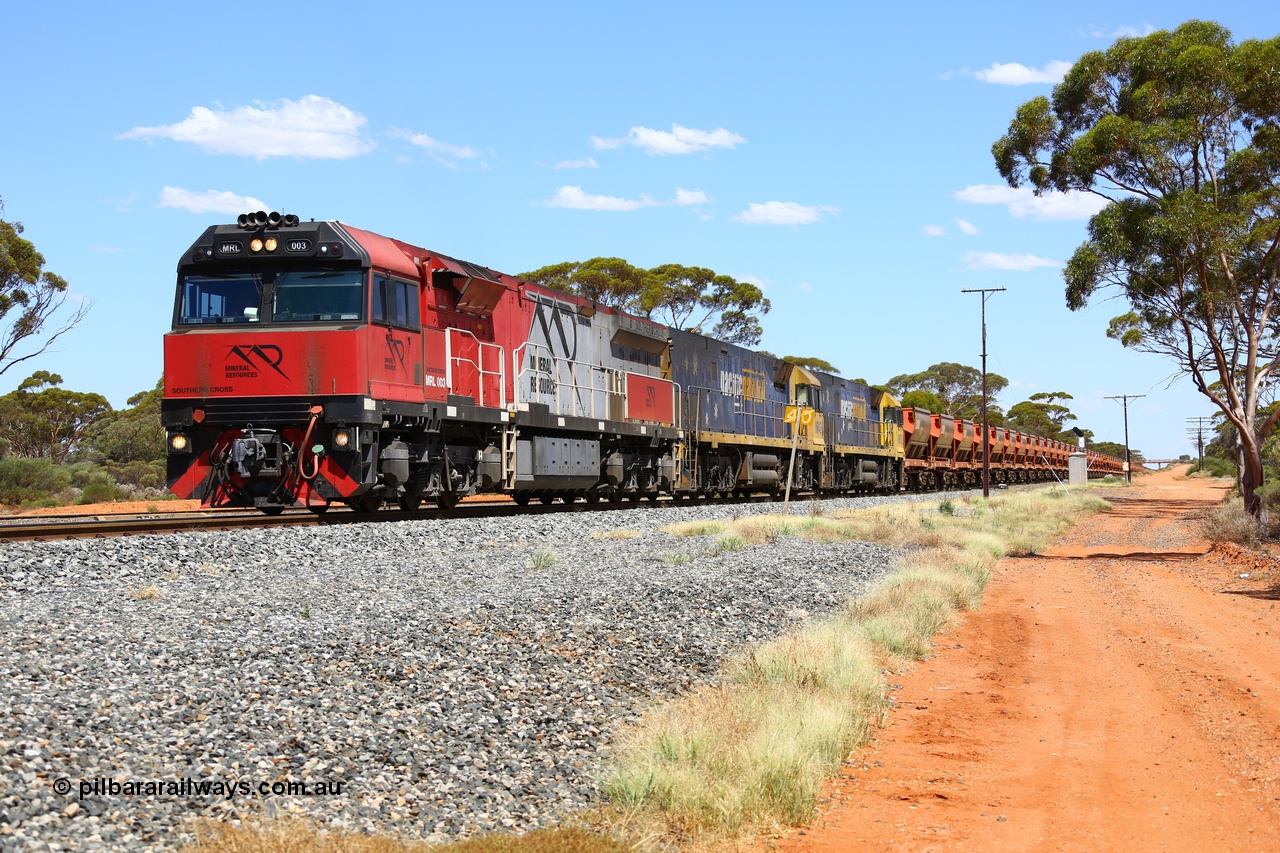 190107 0527
Binduli, following a crew change Mineral Resources empty iron ore train 2034 with Mineral Resources MRL class loco MRL 003 'Southern Cross' with serial R-0113-03/14-506 a UGL Rail Broadmeadow NSW built GE model C44ACi model leads two Pacific National NR class units NR 43 and NR 78 with 53 pairs of MHPYs and 2 single MHLY bottom discharge hopper waggons for 1293 metres and 2258 tonnes.
Keywords: MRL-class;MRL003;R-0113-03/14-506;UGL-Rail-Broadmeadow-NSW;GE;C44aci;