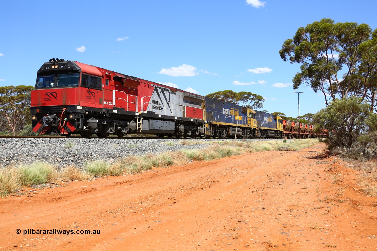 190107 0529
Binduli, following a crew change Mineral Resources empty iron ore train 2034 with Mineral Resources MRL class loco MRL 003 'Southern Cross' with serial R-0113-03/14-506 a UGL Rail Broadmeadow NSW built GE model C44ACi model leads two Pacific National NR class units NR 43 and NR 78 with 53 pairs of MHPYs and 2 single MHLY bottom discharge hopper waggons for 1293 metres and 2258 tonnes.
Keywords: MRL-class;MRL003;R-0113-03/14-506;UGL-Rail-Broadmeadow-NSW;GE;C44aci;