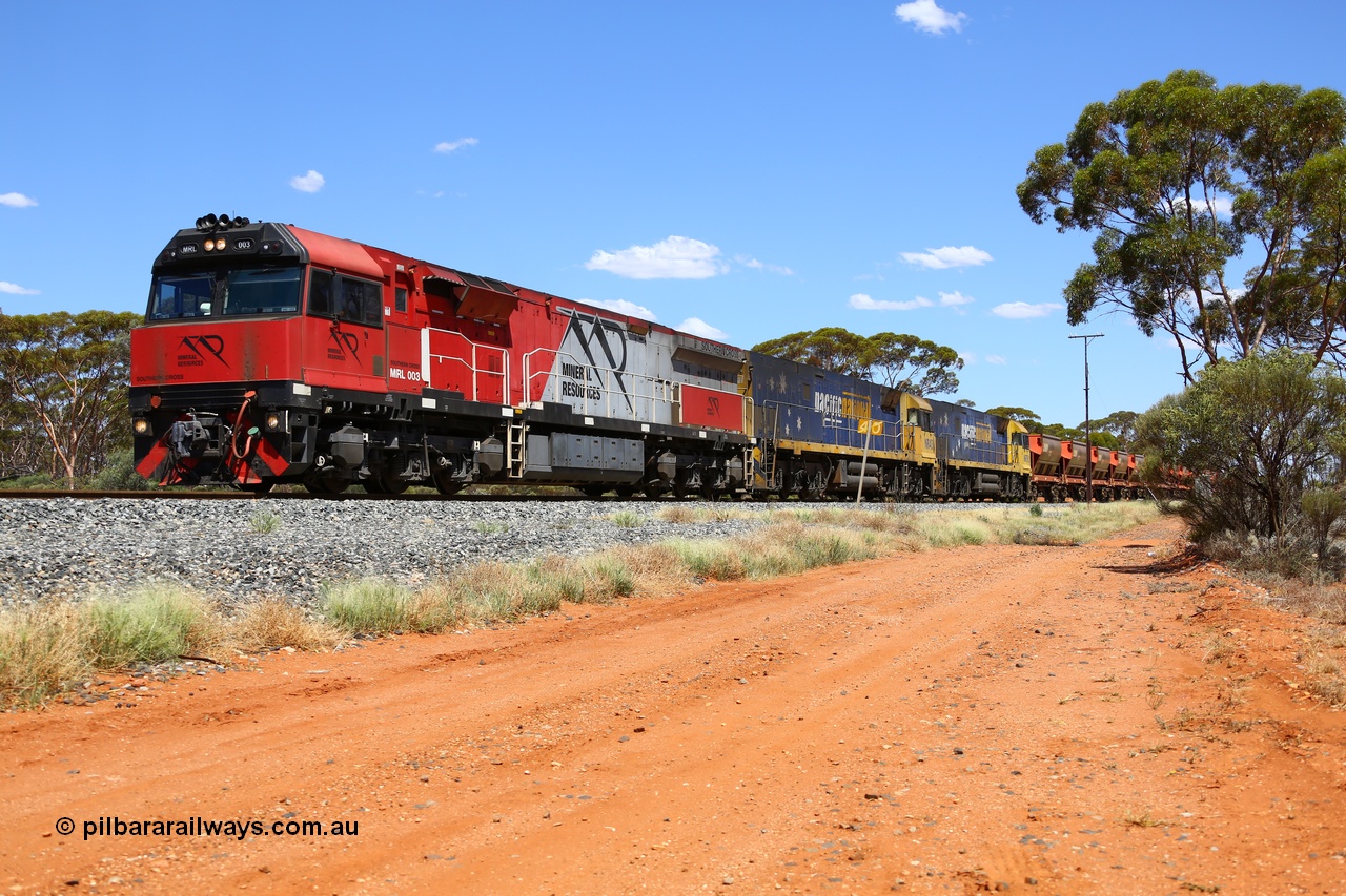 190107 0530
Binduli, following a crew change Mineral Resources empty iron ore train 2034 with Mineral Resources MRL class loco MRL 003 'Southern Cross' with serial R-0113-03/14-506 a UGL Rail Broadmeadow NSW built GE model C44ACi model leads two Pacific National NR class units NR 43 and NR 78 with 53 pairs of MHPYs and 2 single MHLY bottom discharge hopper waggons for 1293 metres and 2258 tonnes.
Keywords: MRL-class;MRL003;R-0113-03/14-506;UGL-Rail-Broadmeadow-NSW;GE;C44aci;
