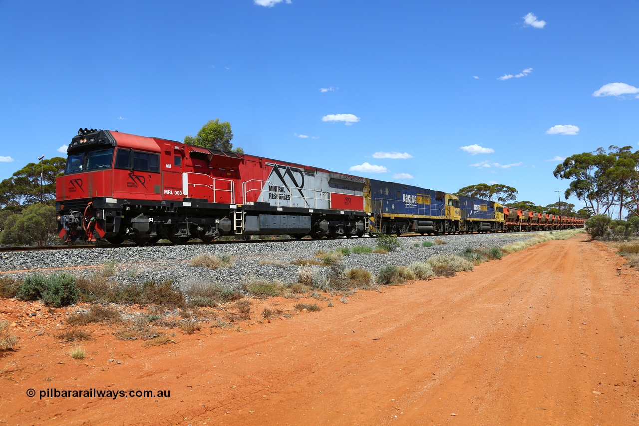 190107 0533
Binduli, following a crew change Mineral Resources empty iron ore train 2034 with Mineral Resources MRL class loco MRL 003 'Southern Cross' with serial R-0113-03/14-506 a UGL Rail Broadmeadow NSW built GE model C44ACi leads two Pacific National NR class units NR 43 and NR 78 with 53 pairs of MHPYs and 2 single MHLY bottom discharge hopper waggons for 1293 metres and 2258 tonnes.
Keywords: MRL-class;MRL003;UGL-Rail-Broadmeadow-NSW;GE;C44ACi;R-0113-03/14-506;