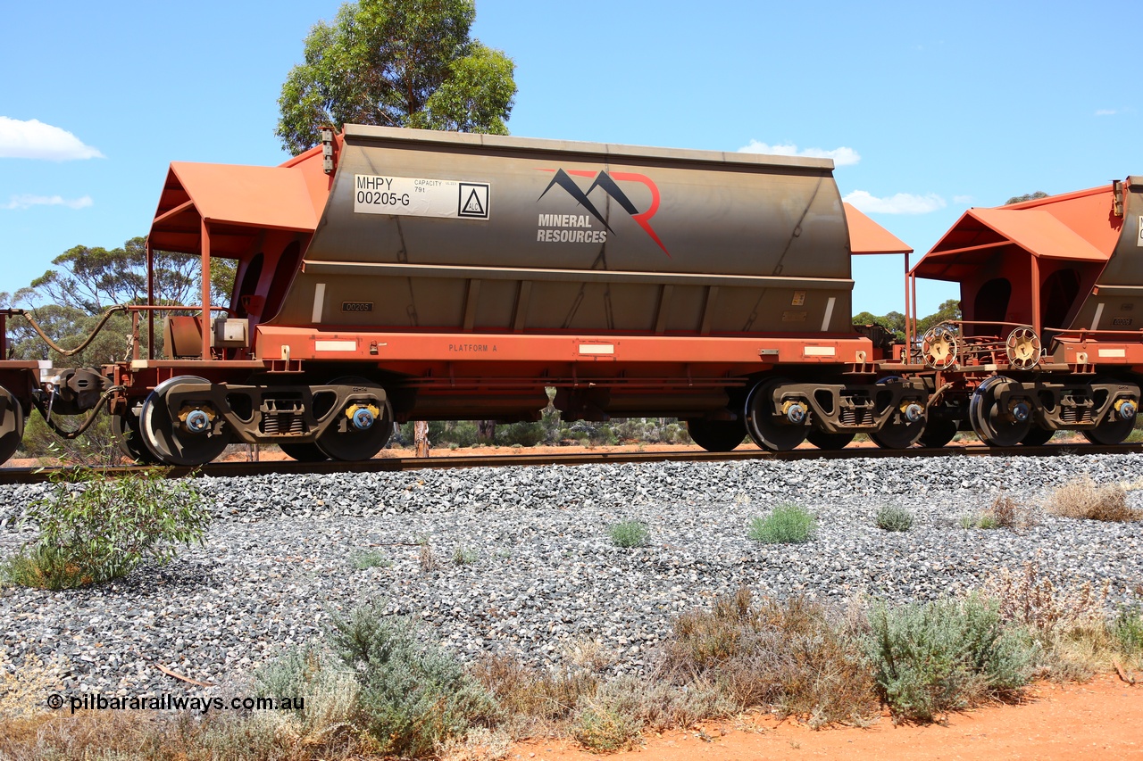 190107 0540
Binduli, on empty Mineral Resources Ltd iron ore train service from Esperance to Koolyanobbing 2034 with MRL's MHPY type iron ore waggon MHPY 00205 built by CSR Yangtze Co China serial 2014/382-205 in 2014 as a batch of 382 units, these bottom discharge hopper waggons are operated in 'married' pairs.
Keywords: MHPY-type;MHPY00205;2014/382-205;CSR-Yangtze-Co-China;