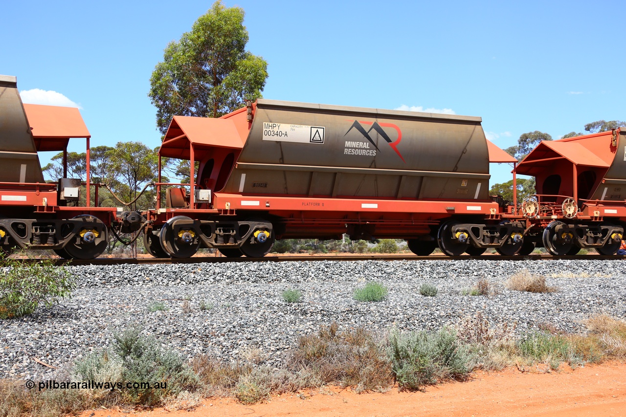 190107 0546
Binduli, on empty Mineral Resources Ltd iron ore train service from Esperance to Koolyanobbing 2034 with MRL's MHPY type iron ore waggon MHPY 00340 built by CSR Yangtze Co China serial 2014/382-340 in 2014 as a batch of 382 units, these bottom discharge hopper waggons are operated in 'married' pairs.
Keywords: MHPY-type;MHPY00340;2014/382-340;CSR-Yangtze-Rolling-Stock-Co-China;