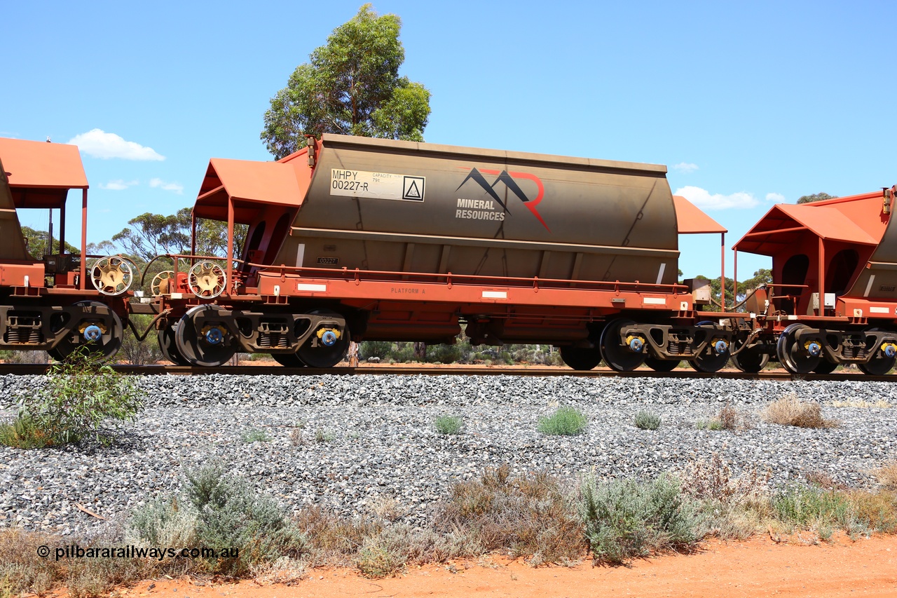 190107 0589
Binduli, on empty Mineral Resources Ltd iron ore train service from Esperance to Koolyanobbing 2034 with MRL's MHPY type iron ore waggon MHPY 00227 built by CSR Yangtze Co China serial 2014/382-227 in 2014 as a batch of 382 units, these bottom discharge hopper waggons are operated in 'married' pairs.
Keywords: MHPY-type;MHPY00227;2014/382-227;CSR-Yangtze-Co-China;