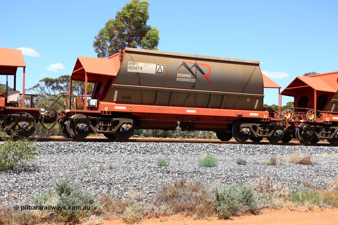 190107 0630
Binduli, on empty Mineral Resources Ltd iron ore train service from Esperance to Koolyanobbing 2034 with MRL's MHPY type iron ore waggon MHPY 00347 built by CSR Yangtze Co China serial 2014/382-347 in 2014 as a batch of 382 units, these bottom discharge hopper waggons are operated in 'married' pairs.
Keywords: MHPY-type;MHPY00347;2014/382-347;CSR-Yangtze-Rolling-Stock-Co-China;