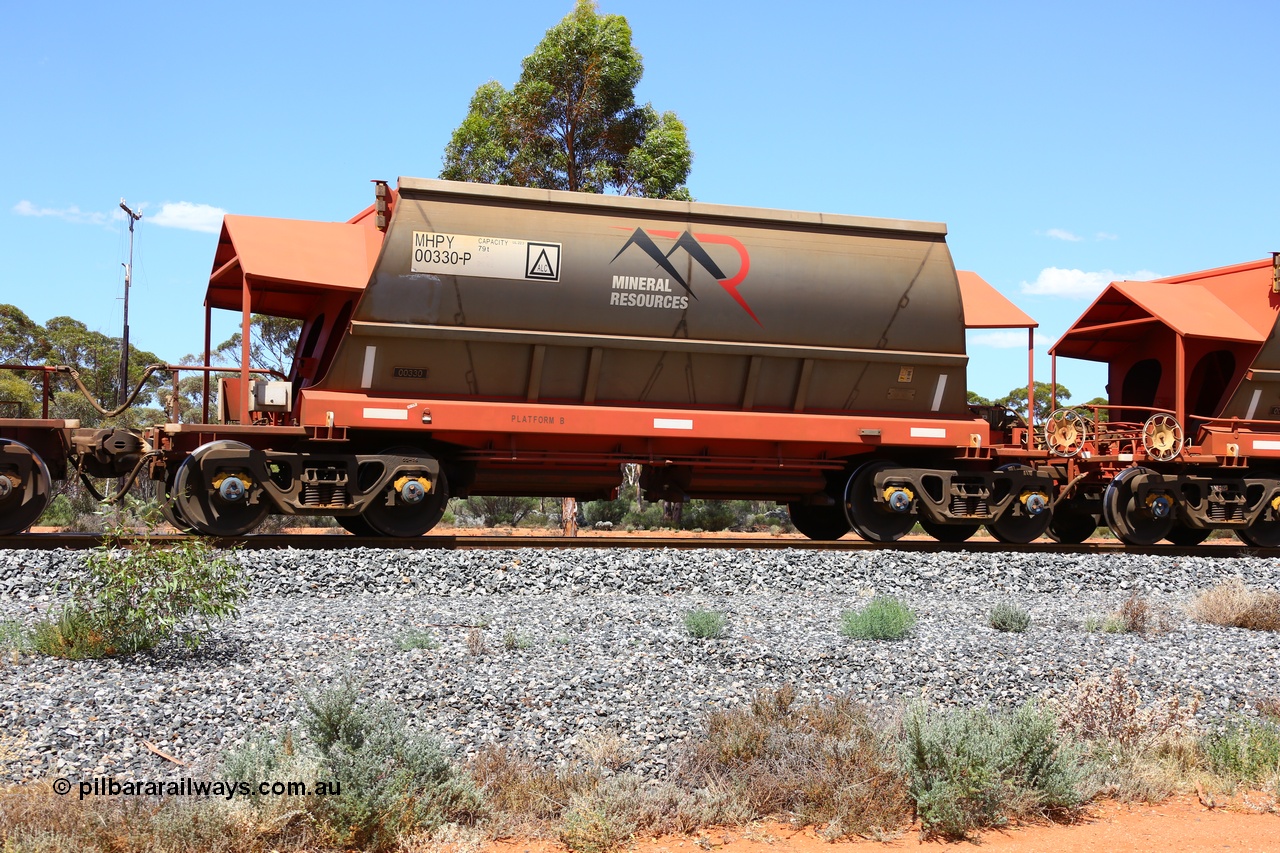 190107 0636
Binduli, on empty Mineral Resources Ltd iron ore train service from Esperance to Koolyanobbing 2034 with MRL's MHPY type iron ore waggon MHPY 00330 built by CSR Yangtze Co China serial 2014/382-330 in 2014 as a batch of 382 units, these bottom discharge hopper waggons are operated in 'married' pairs.
Keywords: MHPY-type;MHPY00330;2014/382-330;CSR-Yangtze-Co-China;