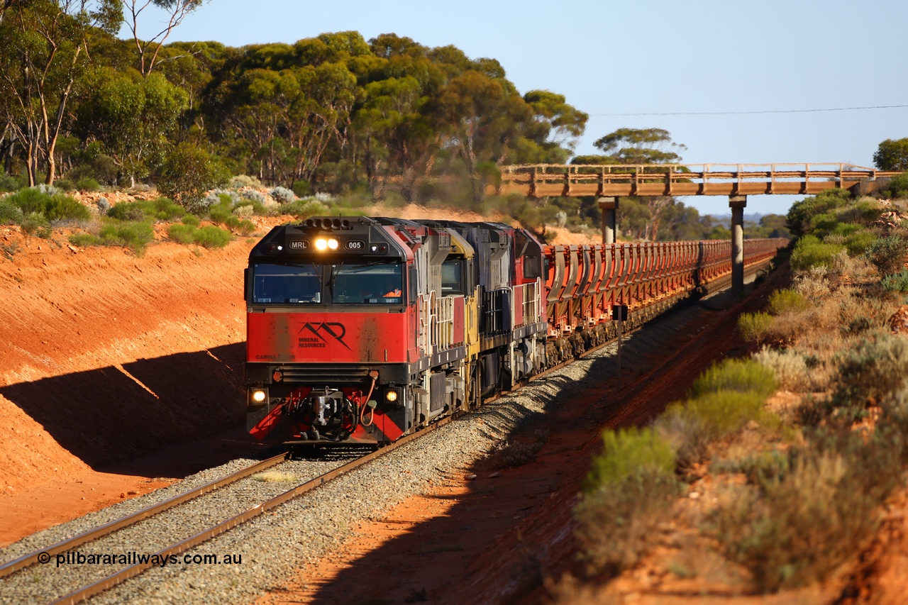 190109 1552
Binduli, Mineral Resources Ltd empty iron ore train 4030 with Mineral Resources own MRL class loco MRL 005 'Carina Flyer' with serial R-0113-05/14-508 a UGL Rail Broadmeadow NSW built GE model C44ACi model locomotive, one of 6 built in 2014.
Keywords: MRL-class;MRL005;R-0113-05/14-508;UGL-Rail-Broadmeadow-NSW;GE;C44aci;