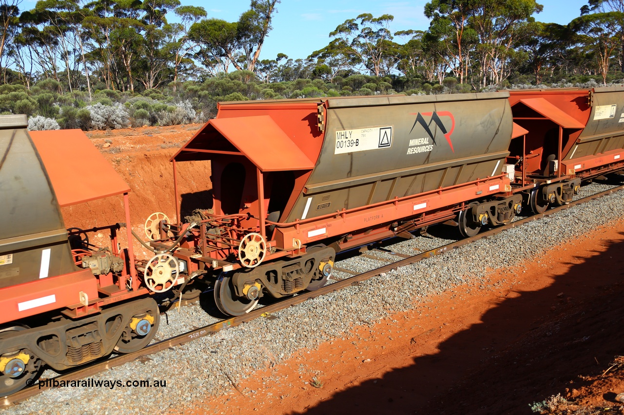 190109 1568
Binduli, Mineral Resources Ltd empty iron ore train 4030 with MRL's MHLY type iron ore waggon MHLY 00139 built by CSR Yangtze Co China serial 2014/382-139 in 2014 as a batch of 382 units, these bottom discharge hopper waggons have been split from the 'married' pairs the rest of the fleet are operated as and are single waggons, of which only four exist.
Keywords: MHLY-type;MHLY00139;2014/382-139;CSR-Yangtze-Rolling-Stock-Co-China;
