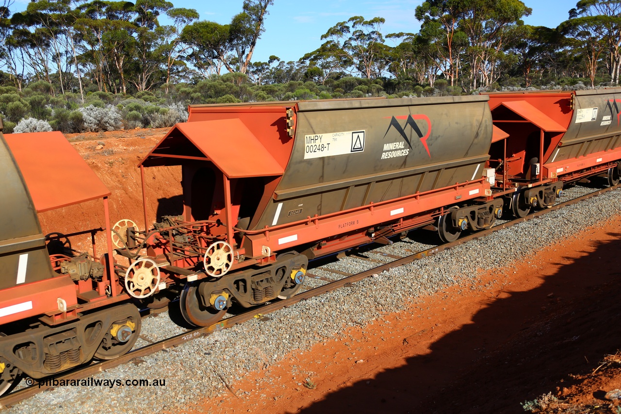 190109 1574
Binduli, Mineral Resources Ltd empty iron ore train 4030 with MRL's MHPY type iron ore waggon MHPY 00248 built by CSR Yangtze Co China serial 2014/382-248 in 2014 as a batch of 382 units, these bottom discharge hopper waggons are operated in 'married' pairs.
Keywords: MHPY-type;MHPY00248;2014/382-248;CSR-Yangtze-Co-China;