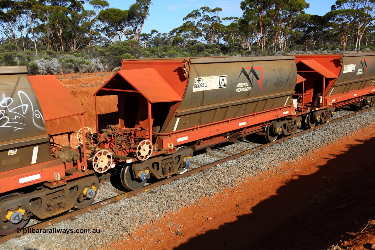 190109 1588
Binduli, Mineral Resources Ltd empty iron ore train 4030 with MRL's MHPY type iron ore waggon MHPY 00095 built by CSR Yangtze Co China serial 2014/382-95 in 2014 as a batch of 382 units, these bottom discharge hopper waggons are operated in 'married' pairs.
Keywords: MHPY-type;MHPY00095;2014/382-95;CSR-Yangtze-Co-China;