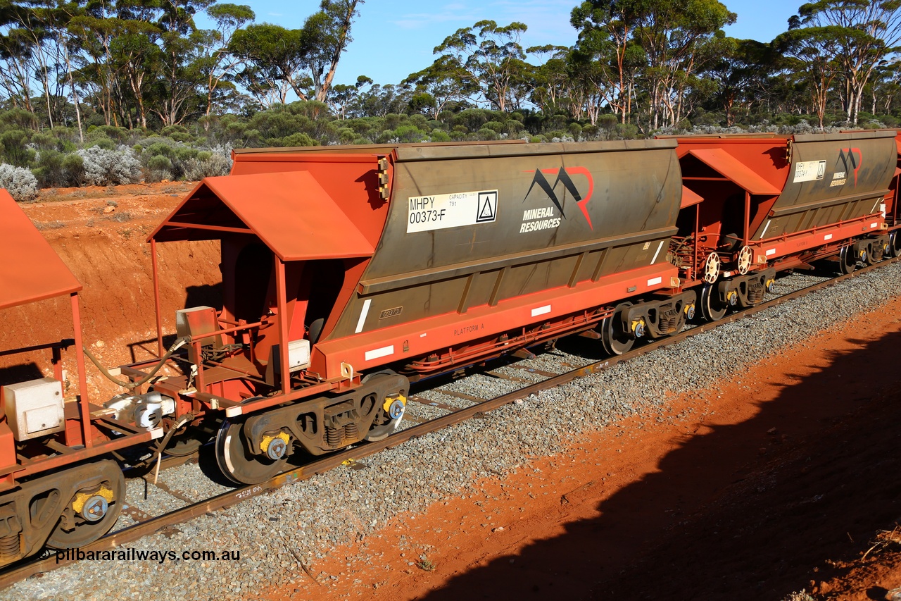 190109 1589
Binduli, Mineral Resources Ltd empty iron ore train 4030 with MRL's MHPY type iron ore waggon MHPY 00373 built by CSR Yangtze Co China serial 2014/382-373 in 2014 as a batch of 382 units, these bottom discharge hopper waggons are operated in 'married' pairs.
Keywords: MHPY-type;MHPY00373;2014/382-373;CSR-Yangtze-Co-China;