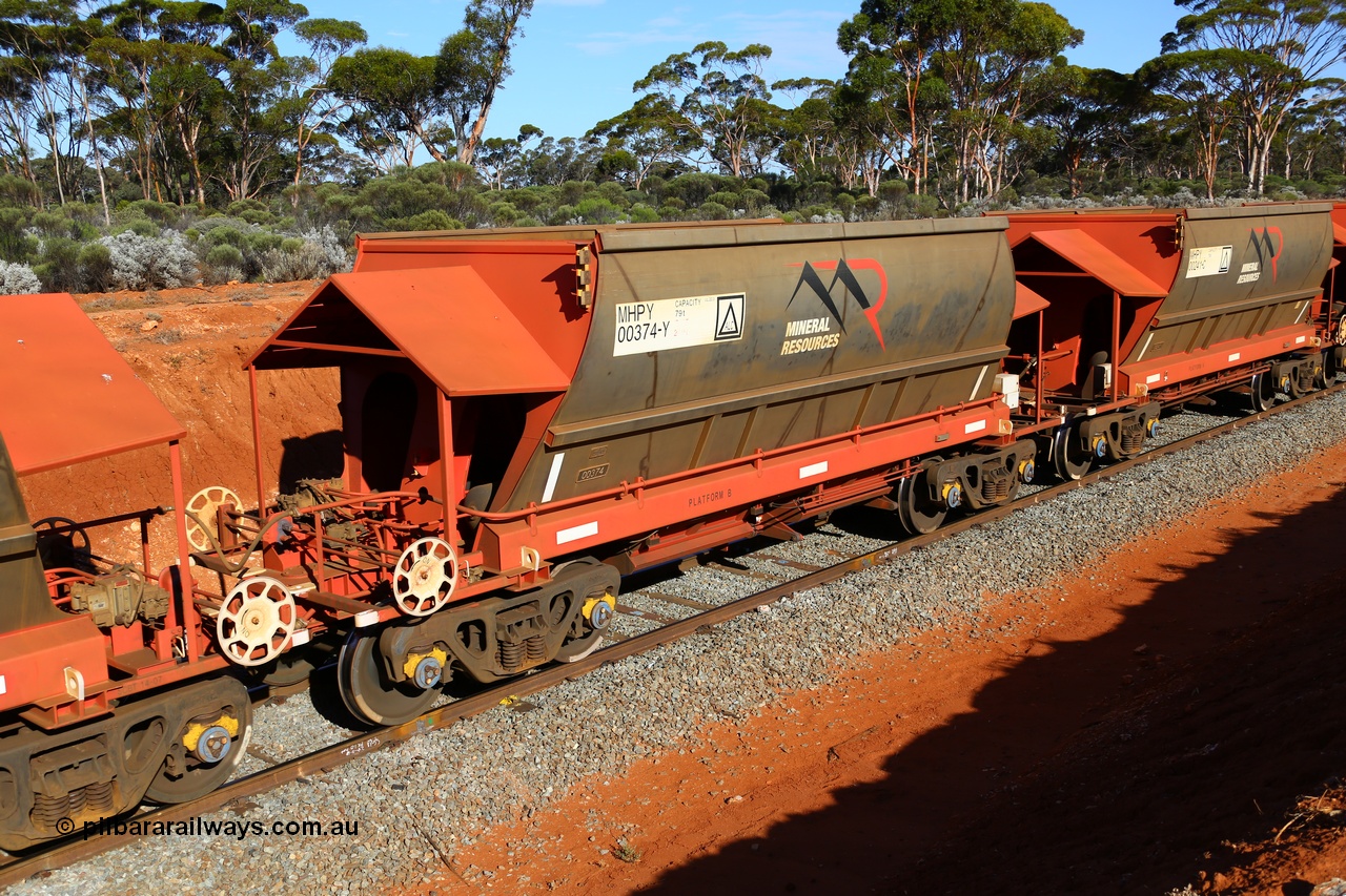190109 1590
Binduli, Mineral Resources Ltd empty iron ore train 4030 with MRL's MHPY type iron ore waggon MHPY 00374 built by CSR Yangtze Co China serial 2014/382-374 in 2014 as a batch of 382 units, these bottom discharge hopper waggons are operated in 'married' pairs.
Keywords: MHPY-type;MHPY00374;2014/382-374;CSR-Yangtze-Co-China;