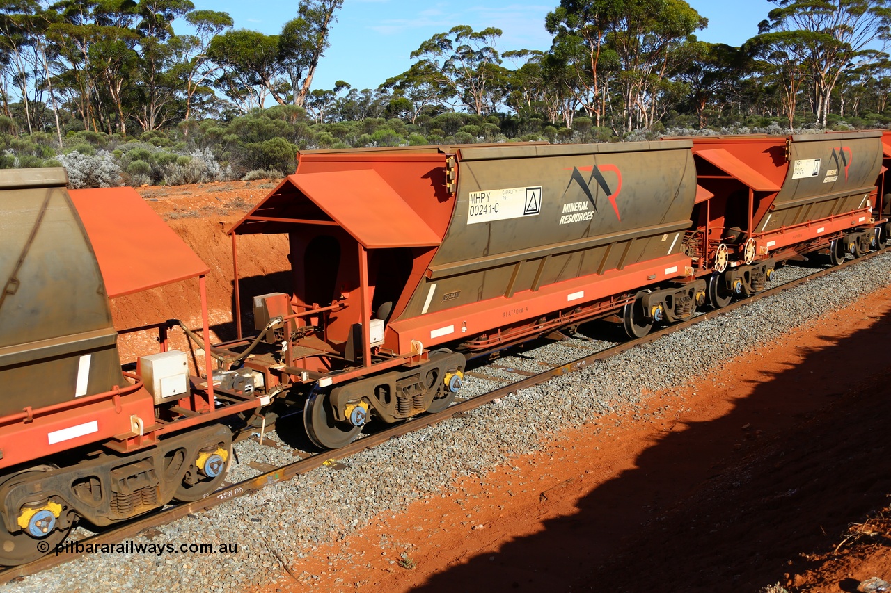 190109 1591
Binduli, Mineral Resources Ltd empty iron ore train 4030 with MRL's MHPY type iron ore waggon MHPY 00241 built by CSR Yangtze Co China serial 2014/382-241 in 2014 as a batch of 382 units, these bottom discharge hopper waggons are operated in 'married' pairs.
Keywords: MHPY-type;MHPY00241;2014/382-241;CSR-Yangtze-Co-China;