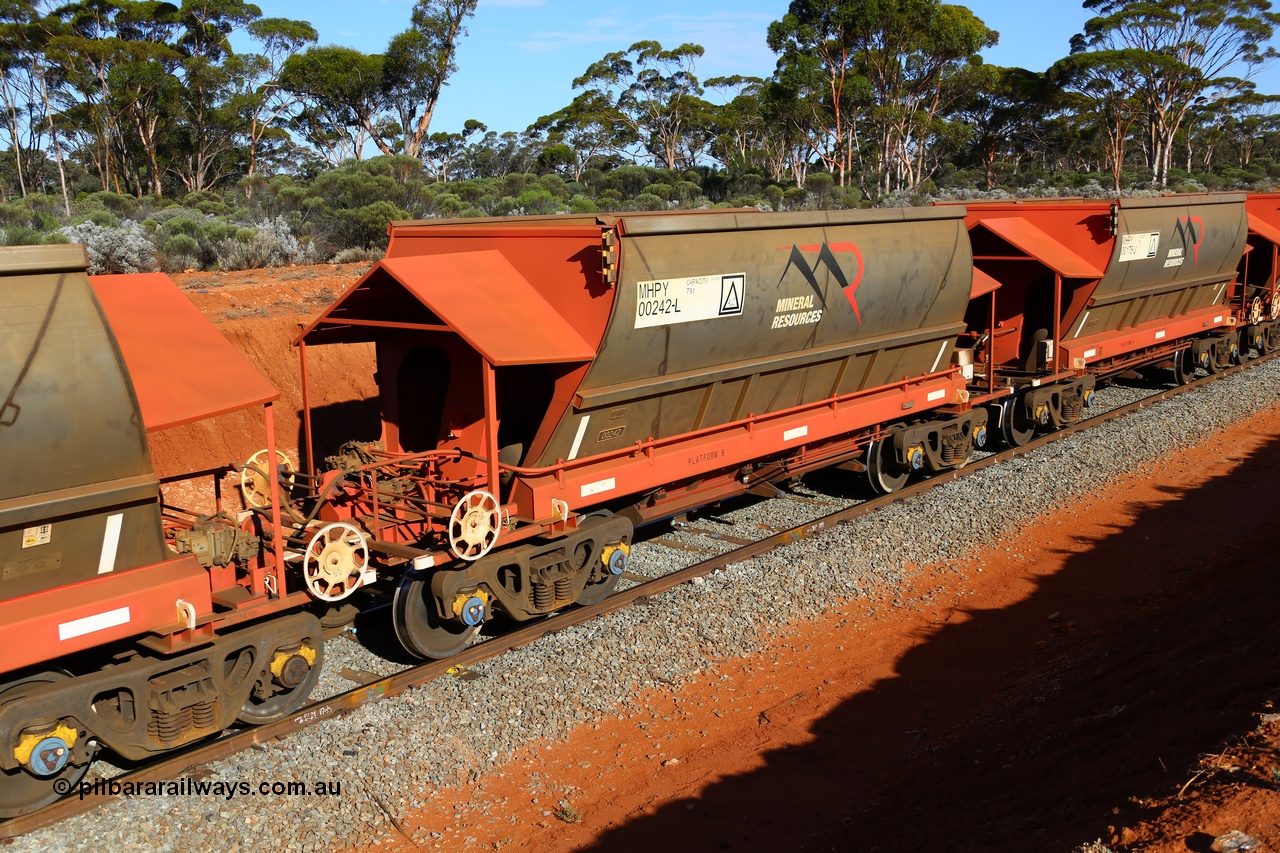 190109 1592
Binduli, Mineral Resources Ltd empty iron ore train 4030 with MRL's MHPY type iron ore waggon MHPY 00242 built by CSR Yangtze Co China serial 2014/382-242 in 2014 as a batch of 382 units, these bottom discharge hopper waggons are operated in 'married' pairs.
Keywords: MHPY-type;MHPY00242;2014/382-242;CSR-Yangtze-Rolling-Stock-Co-China;