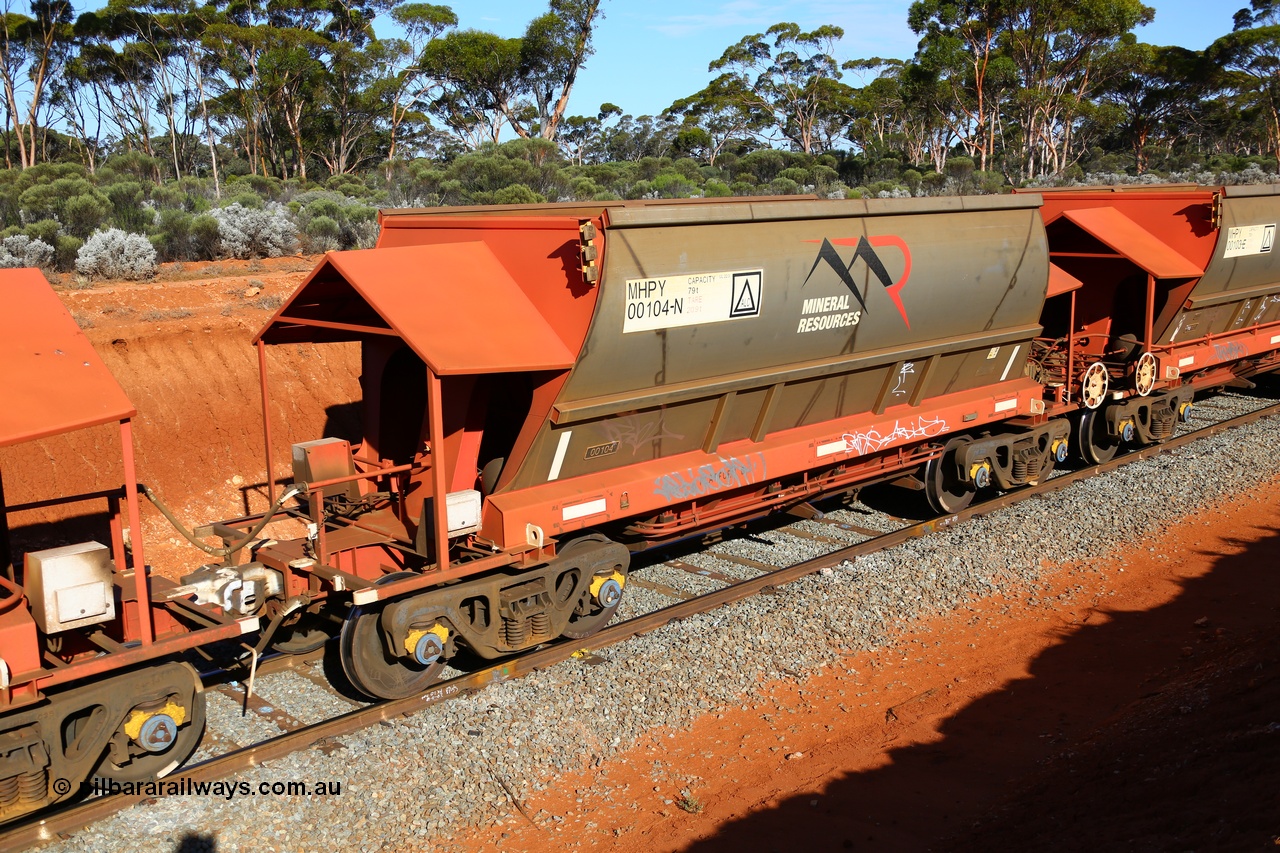190109 1595
Binduli, Mineral Resources Ltd empty iron ore train 4030 with MRL's MHPY type iron ore waggon MHPY 00104 built by CSR Yangtze Co China serial 2014/382-104 in 2014 as a batch of 382 units, these bottom discharge hopper waggons are operated in 'married' pairs.
Keywords: MHPY-type;MHPY00104;2014/382-104;CSR-Yangtze-Co-China;