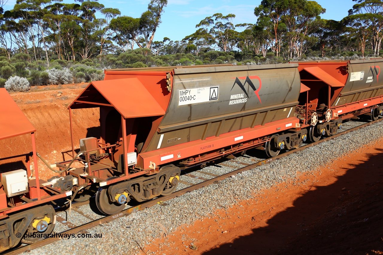 190109 1601
Binduli, Mineral Resources Ltd empty iron ore train 4030 with MRL's MHPY type iron ore waggon MHPY 00040 built by CSR Yangtze Co China serial 2014/382-40 in 2014 as a batch of 382 units, these bottom discharge hopper waggons are operated in 'married' pairs.
Keywords: MHPY-type;MHPY00040;2014/382-40;CSR-Yangtze-Co-China;