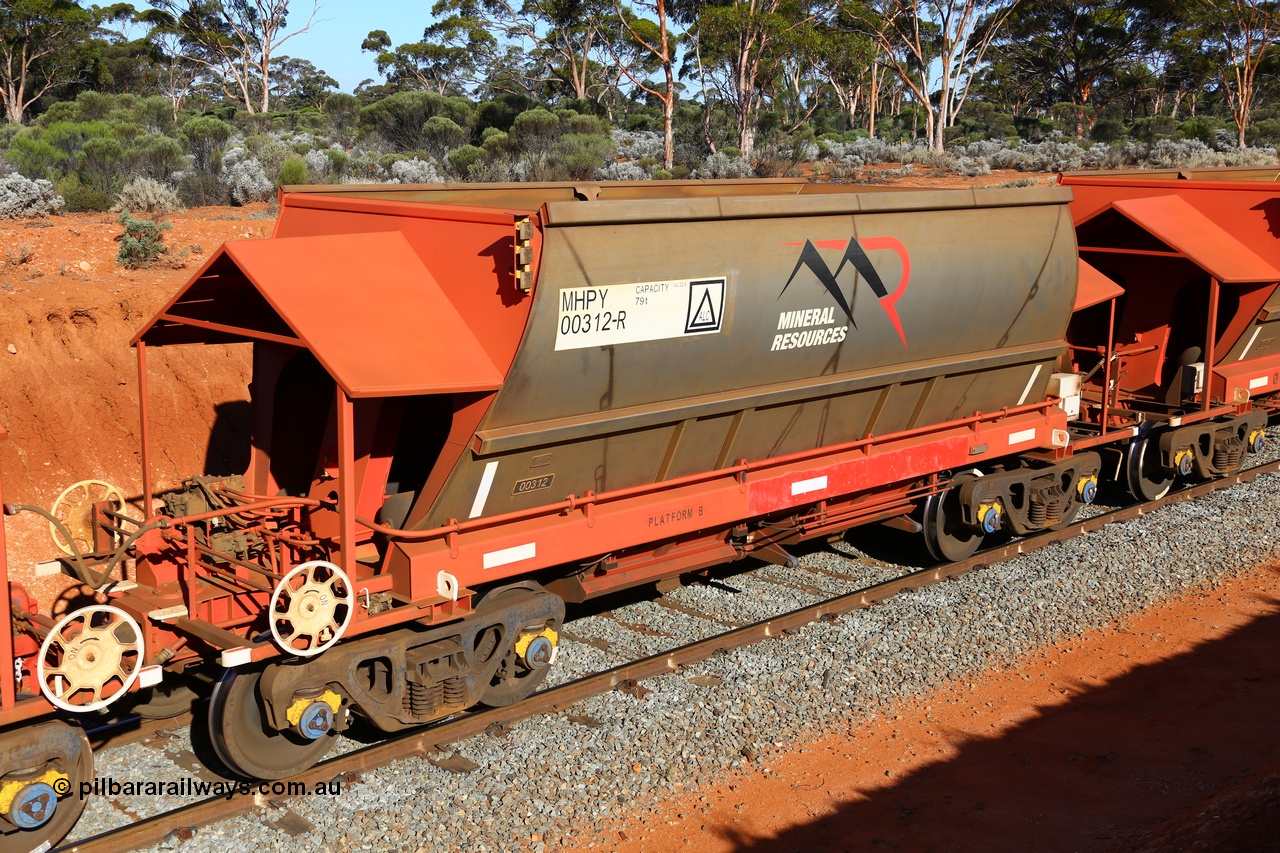 190109 1607
Binduli, Mineral Resources Ltd empty iron ore train 4030 with MRL's MHPY type iron ore waggon MHPY 00312 built by CSR Yangtze Co China serial 2014/382-312 in 2014 as a batch of 382 units, these bottom discharge hopper waggons are operated in 'married' pairs.
Keywords: MHPY-type;MHPY00312;2014/382-312;CSR-Yangtze-Rolling-Stock-Co-China;
