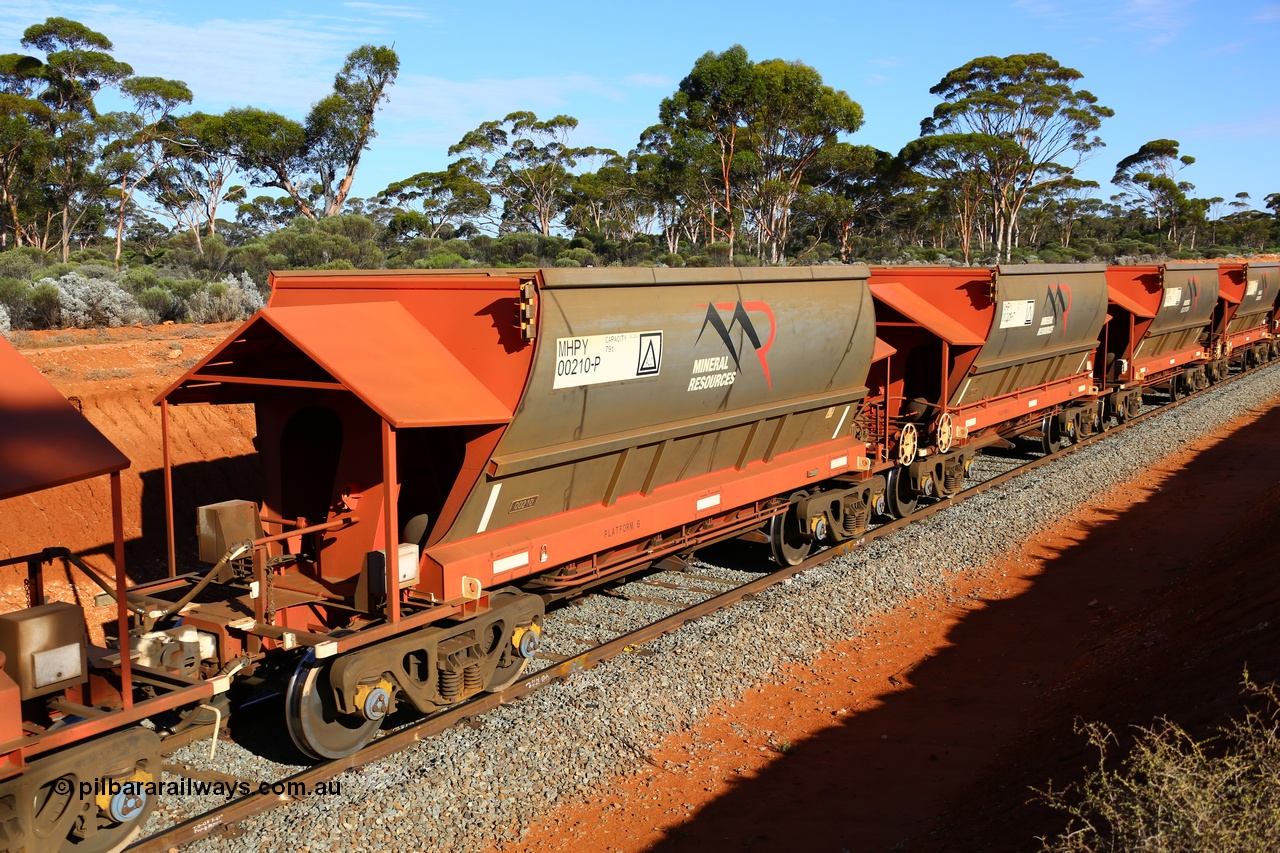 190109 1619
Binduli, Mineral Resources Ltd empty iron ore train 4030 with MRL's MHPY type iron ore waggon MHPY 00210 built by CSR Yangtze Co China serial 2014/382-210 in 2014 as a batch of 382 units, these bottom discharge hopper waggons are operated in 'married' pairs.
Keywords: MHPY-type;MHPY00210;2014/382-210;CSR-Yangtze-Co-China;